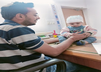 Dr-vivek-bhatt-Child-specialist-pediatrician-Mavdi-rajkot-Gujarat-1